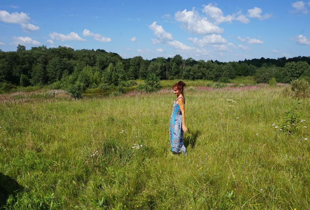 In blue dress in field #18