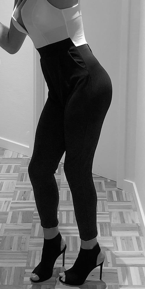 Black & white jumpsuit huge cleavage #3