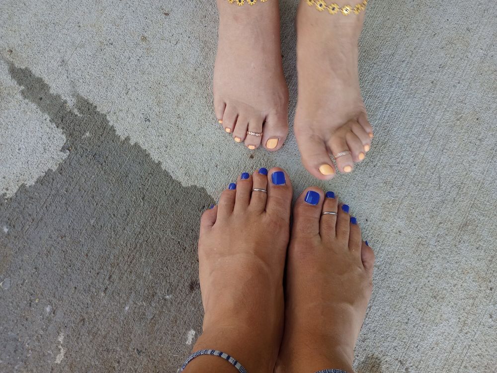 Showing off our pedicures in the pool #3