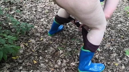 peeing in rubber boots         