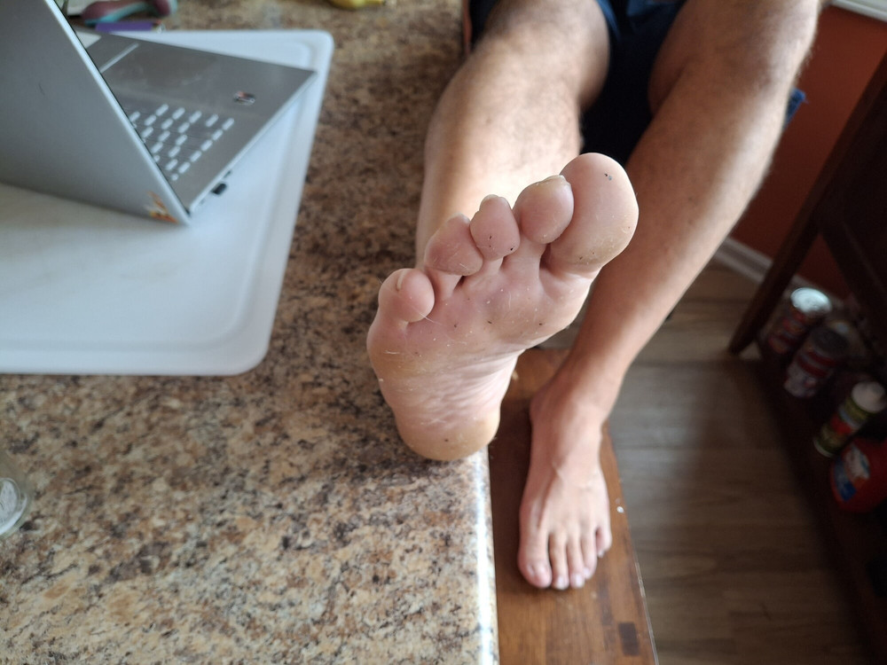 My feet up on the kitchen counter exposing my soles #11