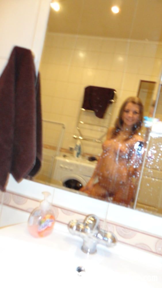 Amateur brunette babe taking selfies before her shower #24