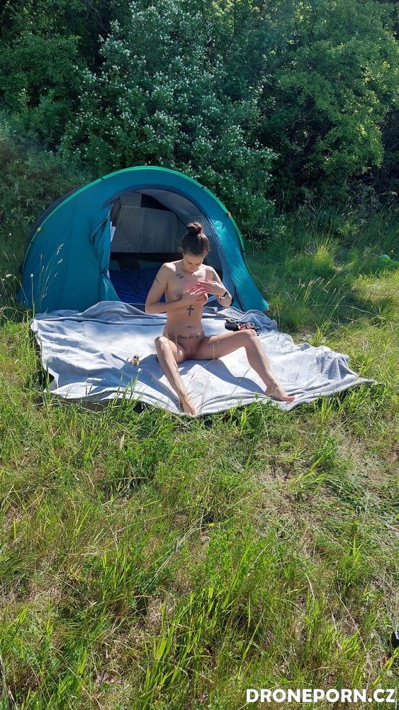 Nudist MILF sunbathing and masturbating