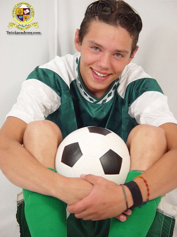 Latino twink Gabriel poses in his soccer kit #7