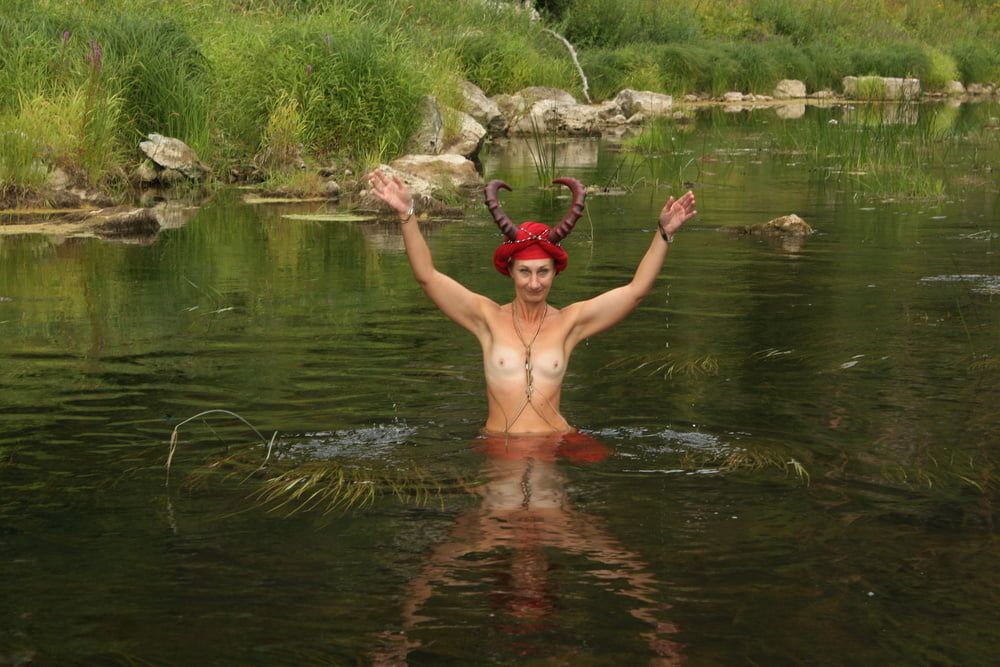 With Horns In Red Dress In Shallow River #51