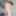 Playful beauty Lillie Pie smiles flirtatiously