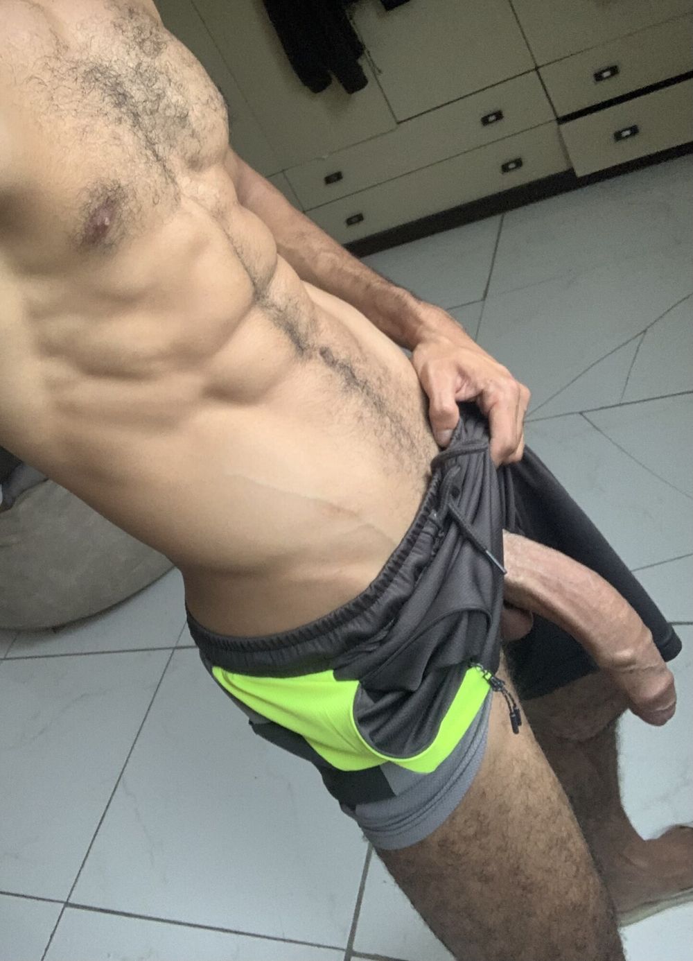 Huge dick in shorts without underwear
