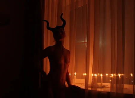 naked maleficent with candles         