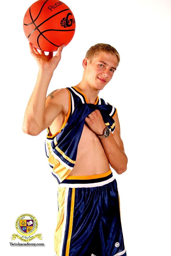 Blond teenage Latvian hunk poses in his basketball uniform #4