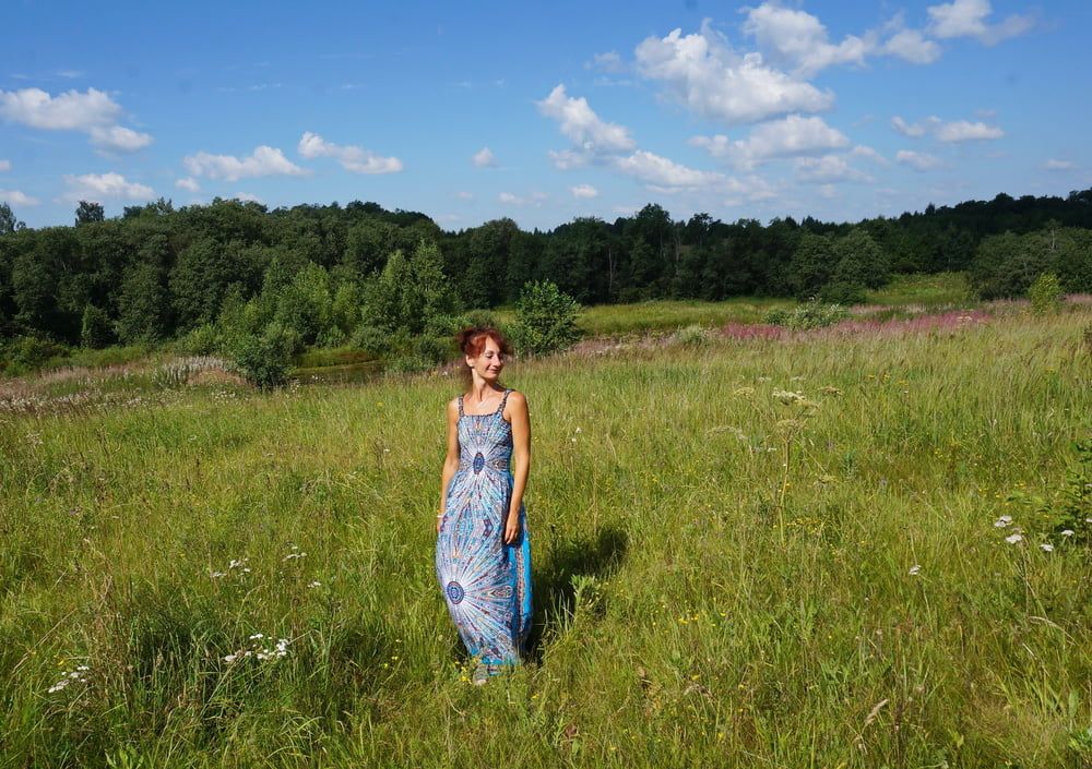 In blue dress in field #16