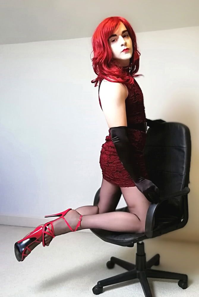 Marie crossdresser in lacy red dress and sheer pantyhose