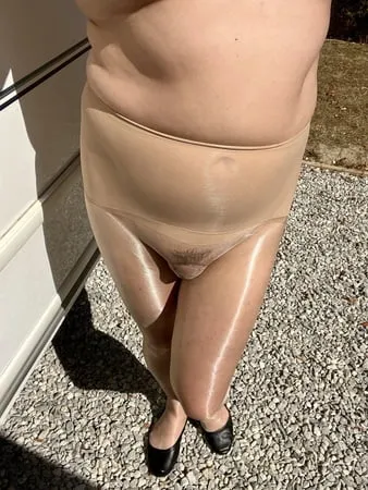 sissy in sheer pantyhose outside         