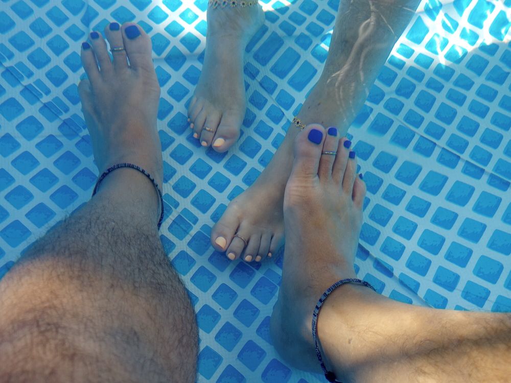 Showing off our pedicures in the pool #14