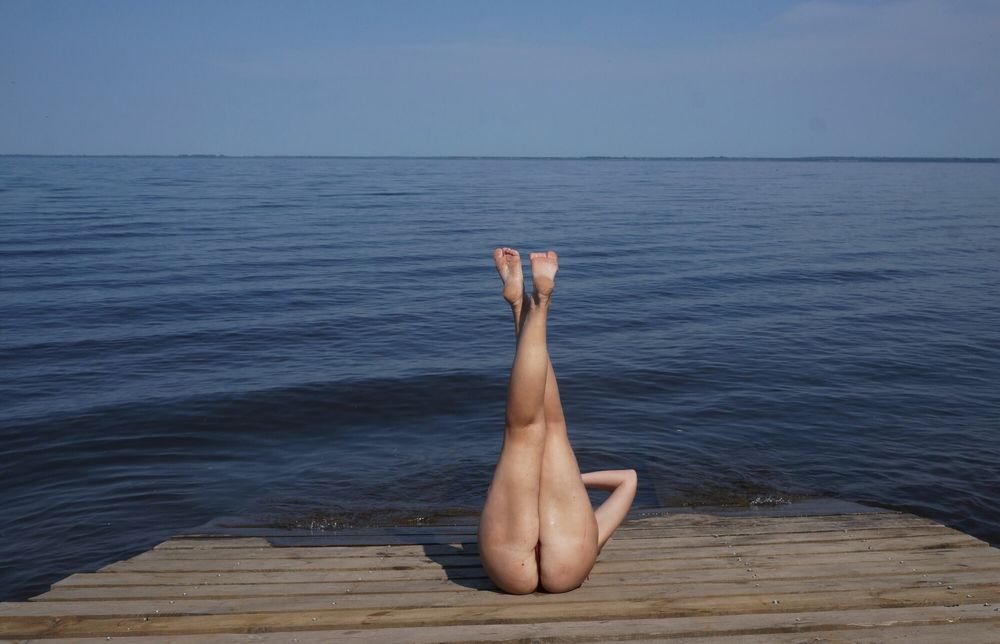 Legs play on a wooden platform #3