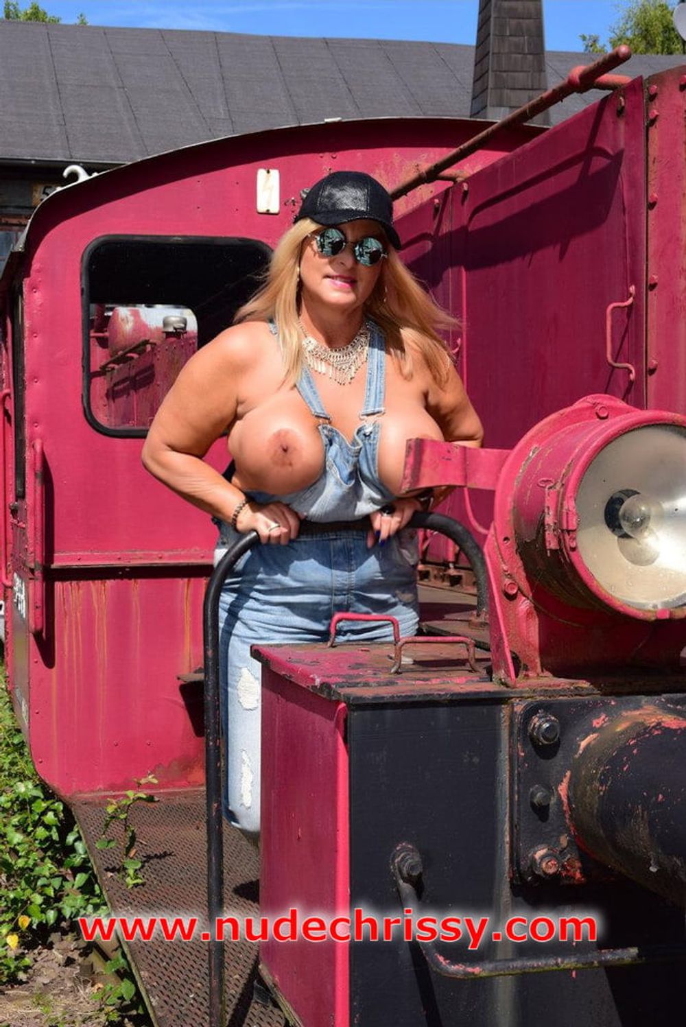 Naked between old locomotives #3