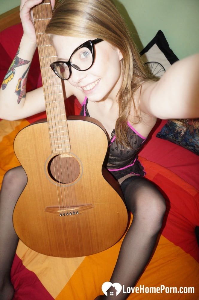 Cute nerdy guitarist posing in some lingerie #6