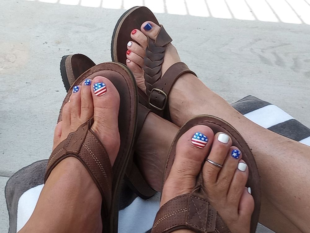 Showing off our wet  pedicured toes  #26