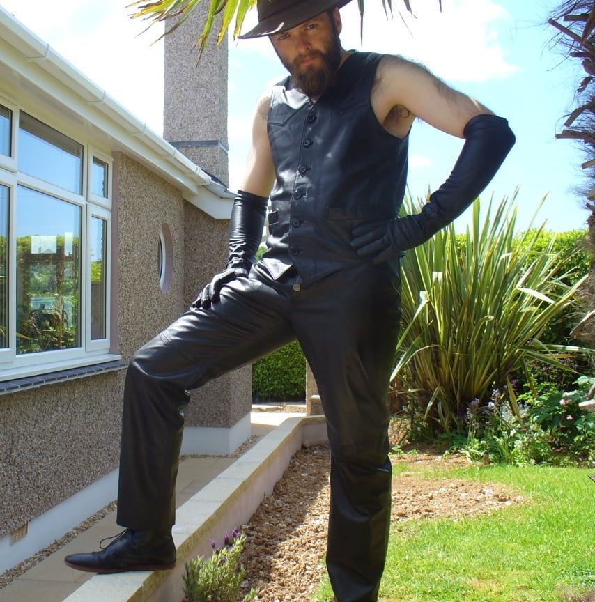 Leather Master outdoors posing in full leather #11