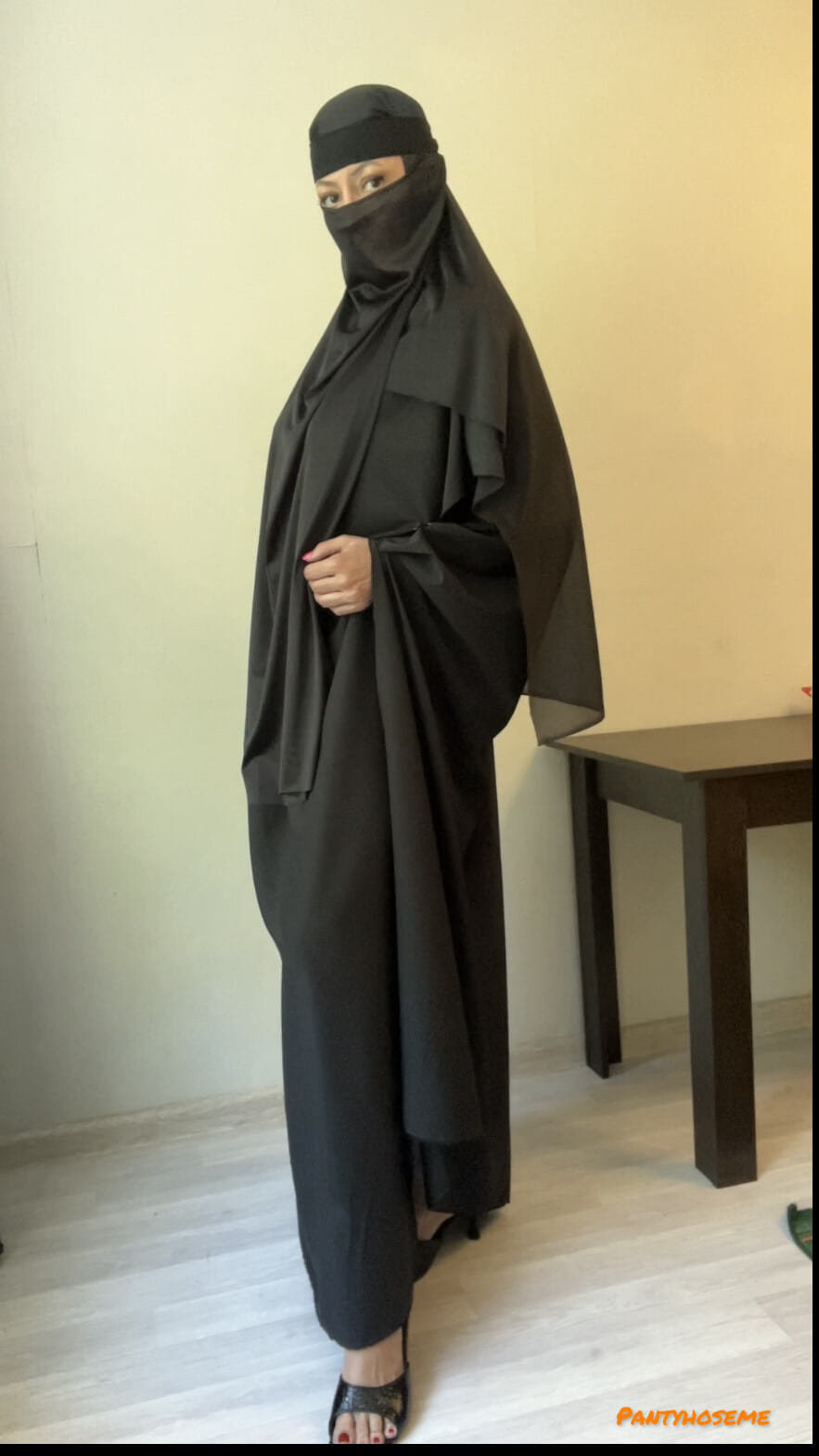 Woman In Black Niqab and Tan Pantyhose
