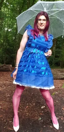 blue dress in the rain in july         