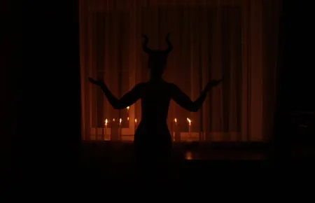 naked maleficent with candles         