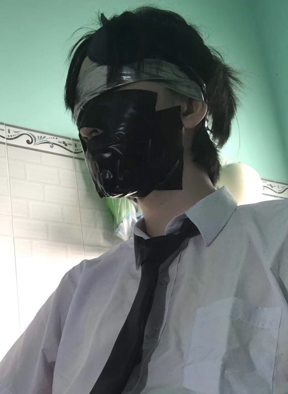 Wearing a white shirt and shiny black tie, gagged with duct  #22