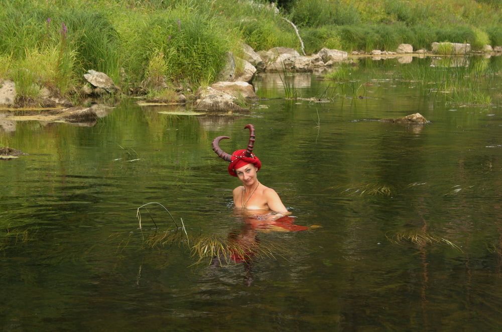 With Horns In Red Dress In Shallow River #34