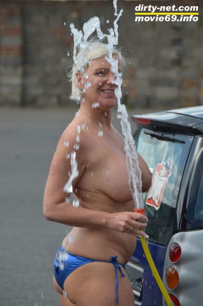 Jill Summer at the carwash in a bikini and topless #50