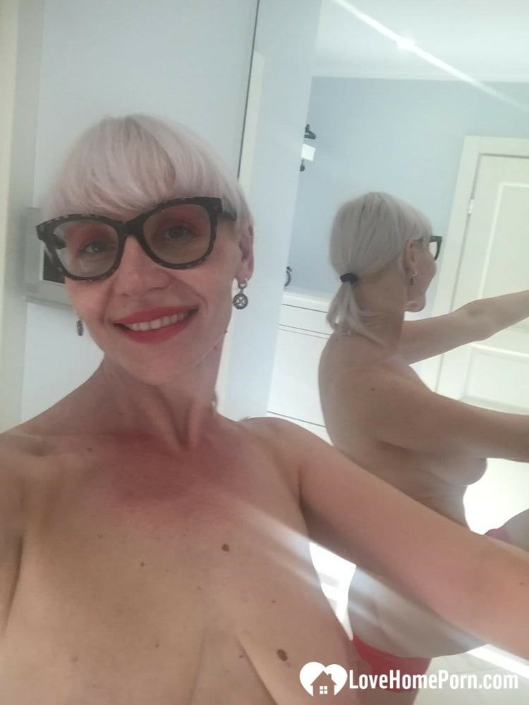 Blonde MILF with glasses teasing with nudes #28