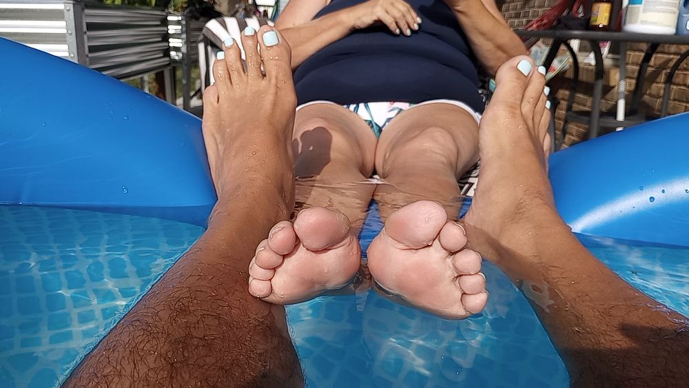 Playing footsie in the pool #4