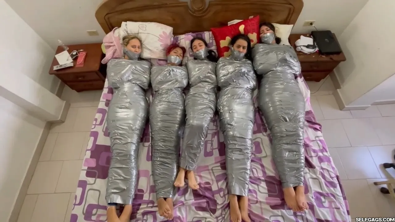 5 Mummified Girls Barefoot In Duct Tape Bondage