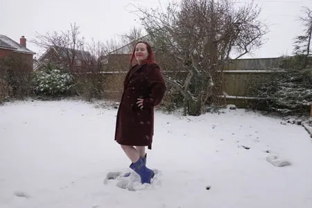 pregnant flashing naked in the cold snow         