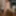 Alba strips off her lingerie by the dining table