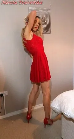    alessia travestita in flirty red dress         