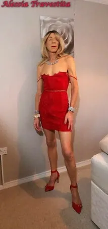    alessia travestita in red velvet dress         