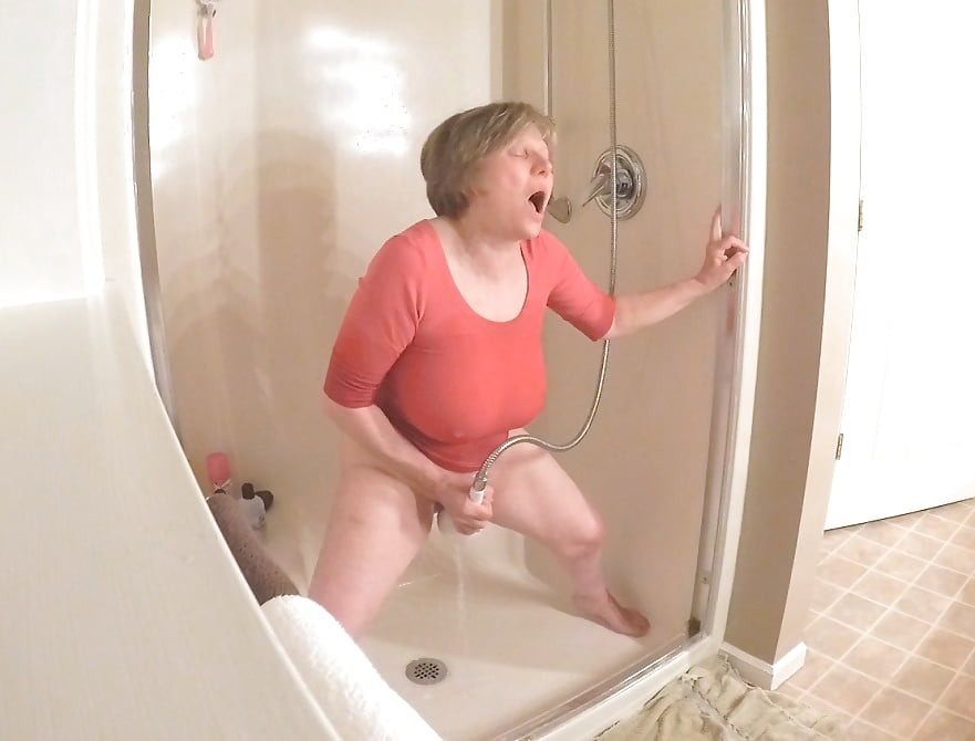GILF masturbates in wet t-shirt #49