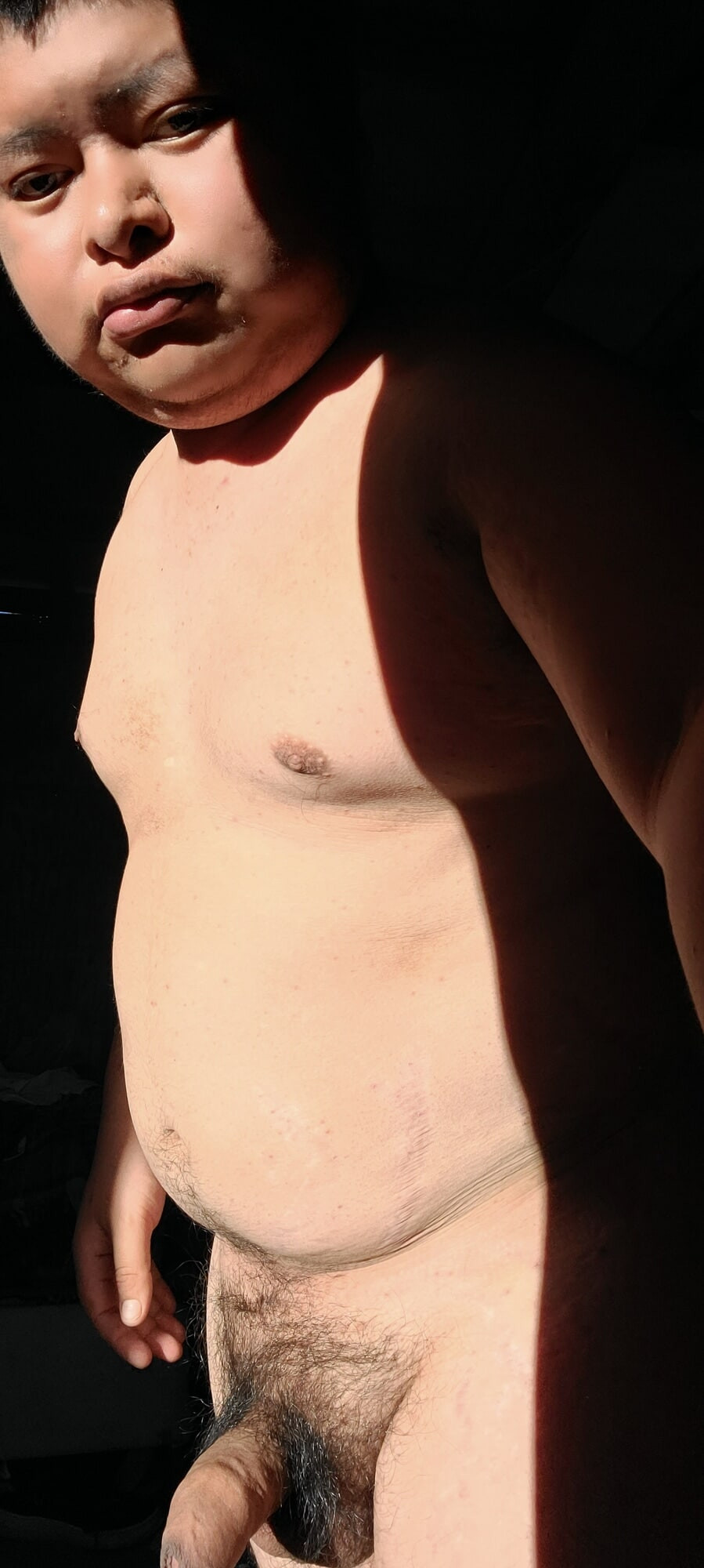 masturbating by pulling the penis