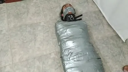 heavily duct tape mummified by crazy bondage women         