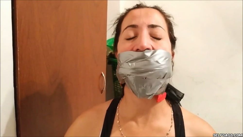 Self-Gagged Latina Mom With A Mouthful Of Socks - Selfgags