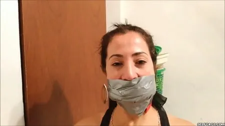 self gagged latina mom with a mouthful of socks selfgags         