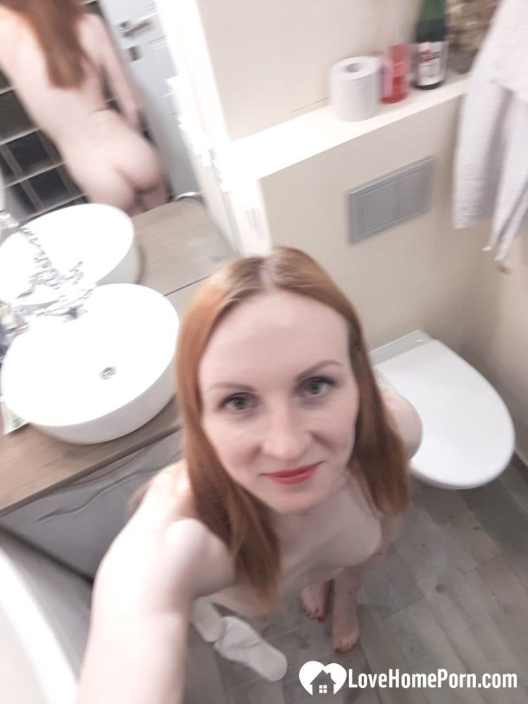 Skinny redhead with small tits in the mirror #36