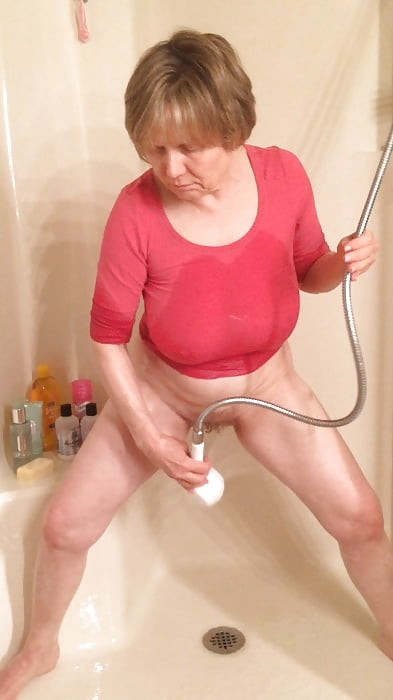 GILF masturbates in wet t-shirt #14