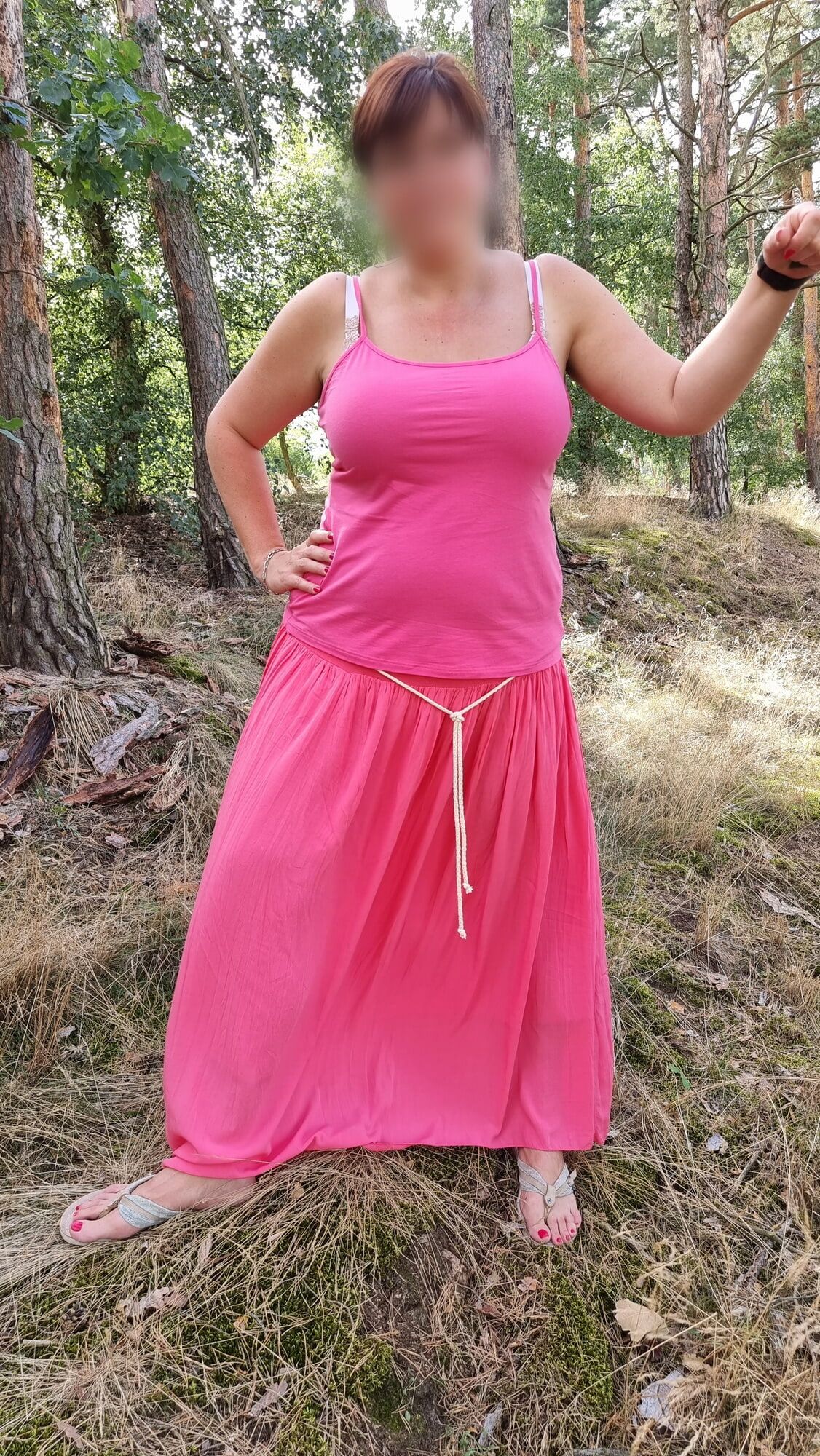 busty milf showing off in nature
