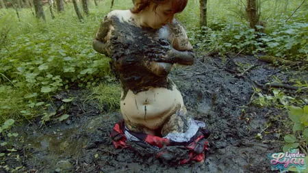 red riding hood in forest mud         