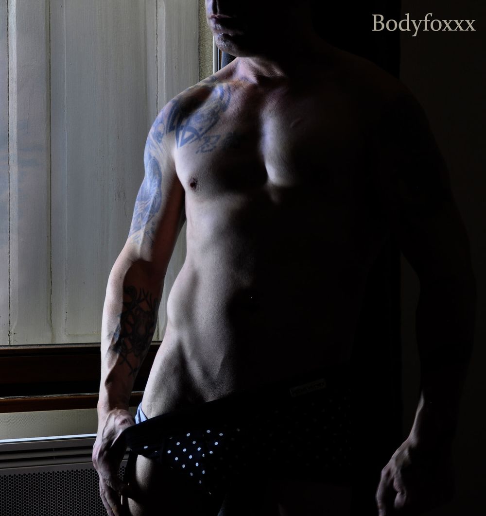 sexy man poses in boxer and string #3