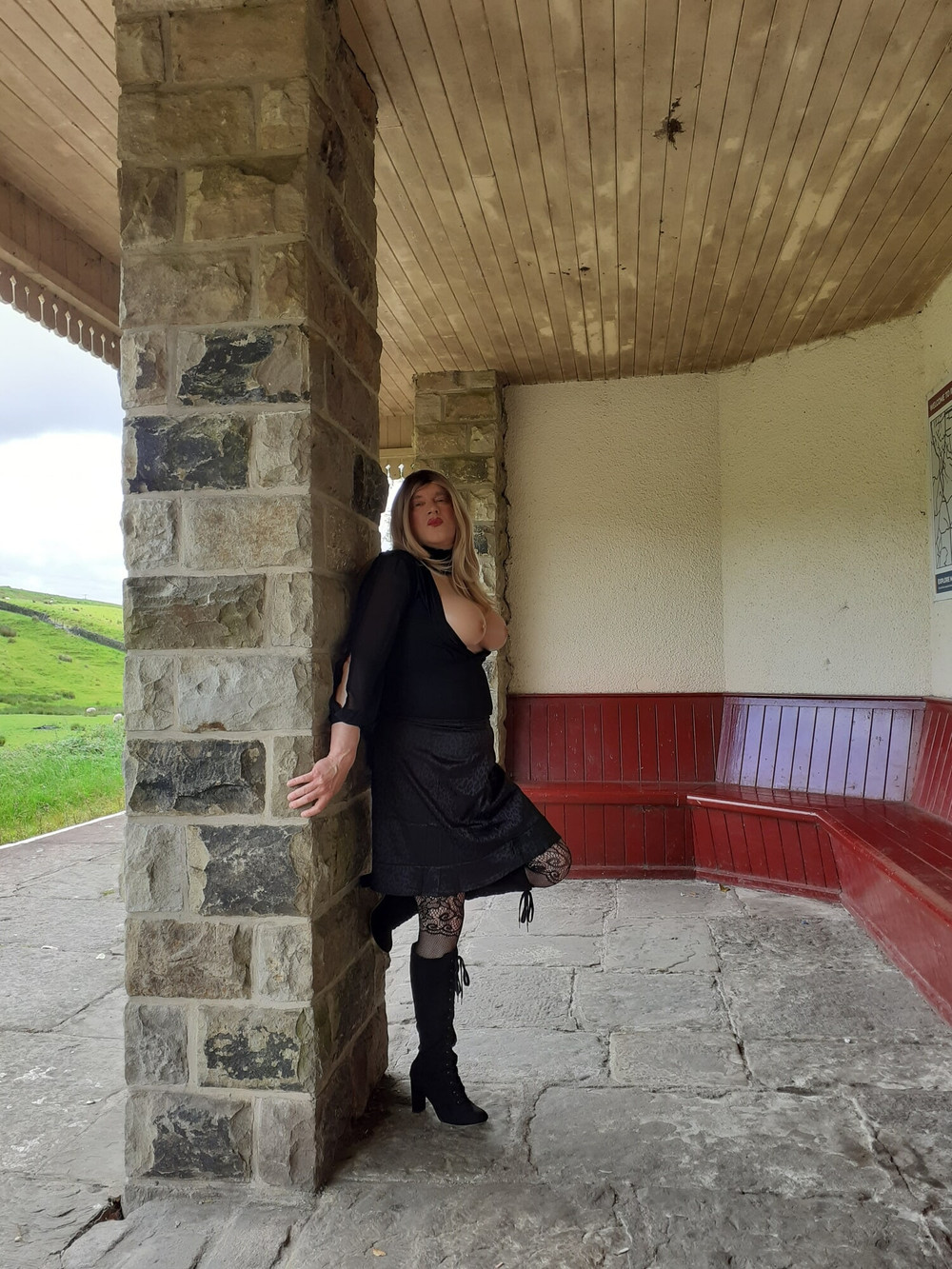 Posing outdoors on a station platform #15