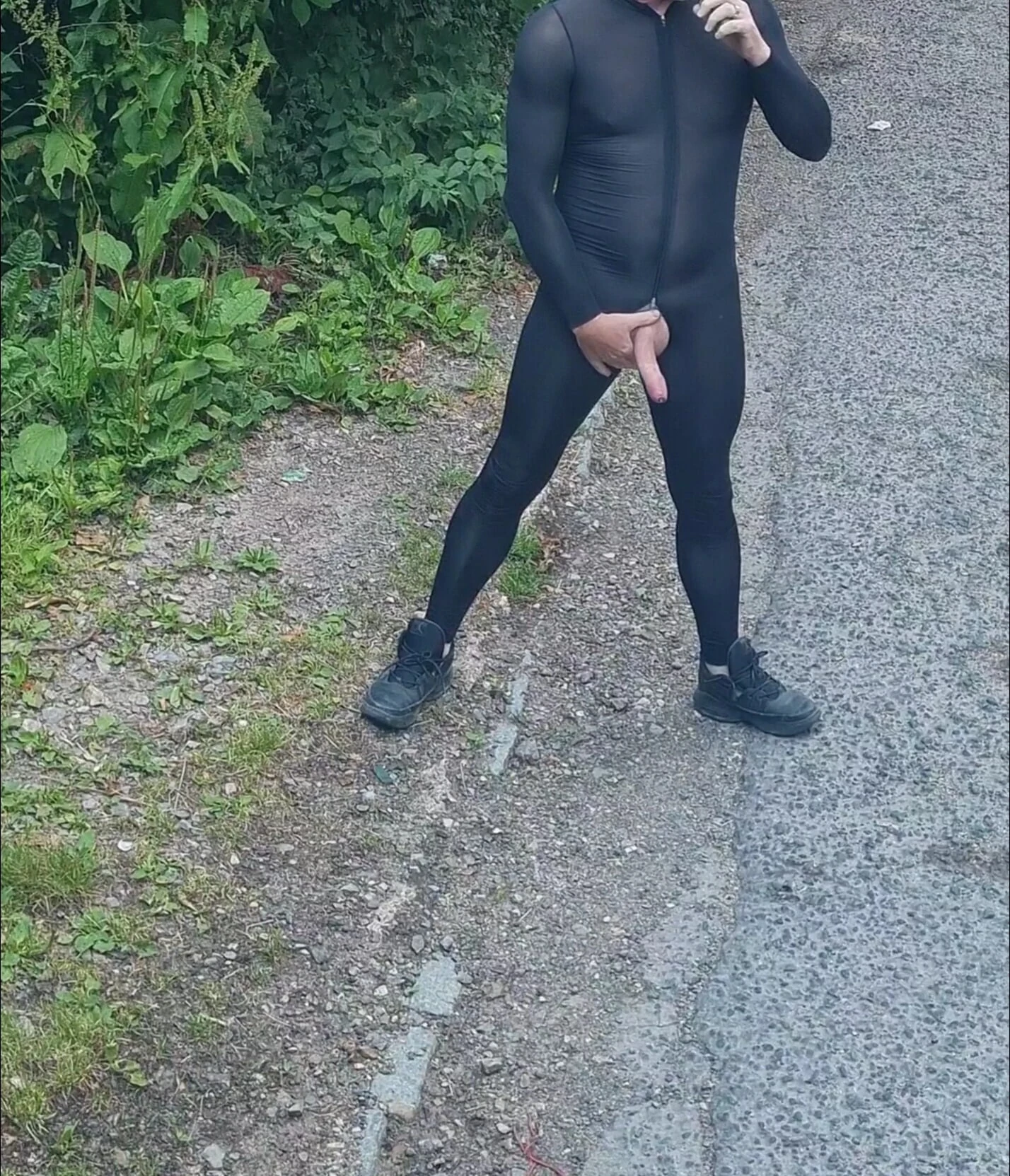 Outdoor wank wearing spandex bodysuit 