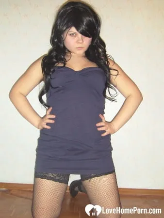 girlfriend in stockings showing off her desirable body         