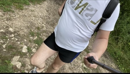 A photo of a naked walk in the summer forest
