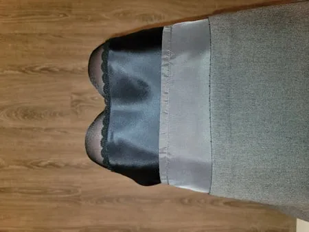 grey pencil skirt with black silky half slip         